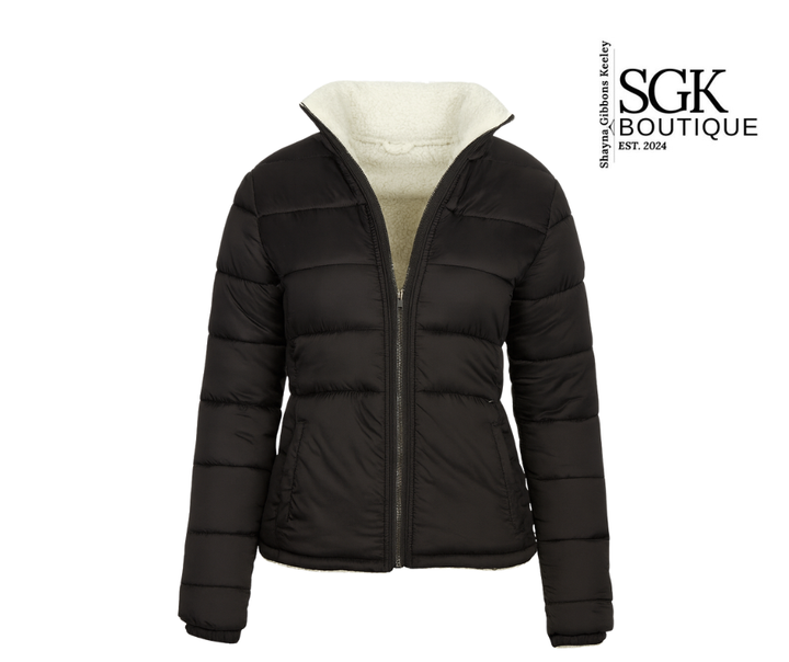 Black puffer jacket with cream lining on a white background, featuring SGK Boutique logo.