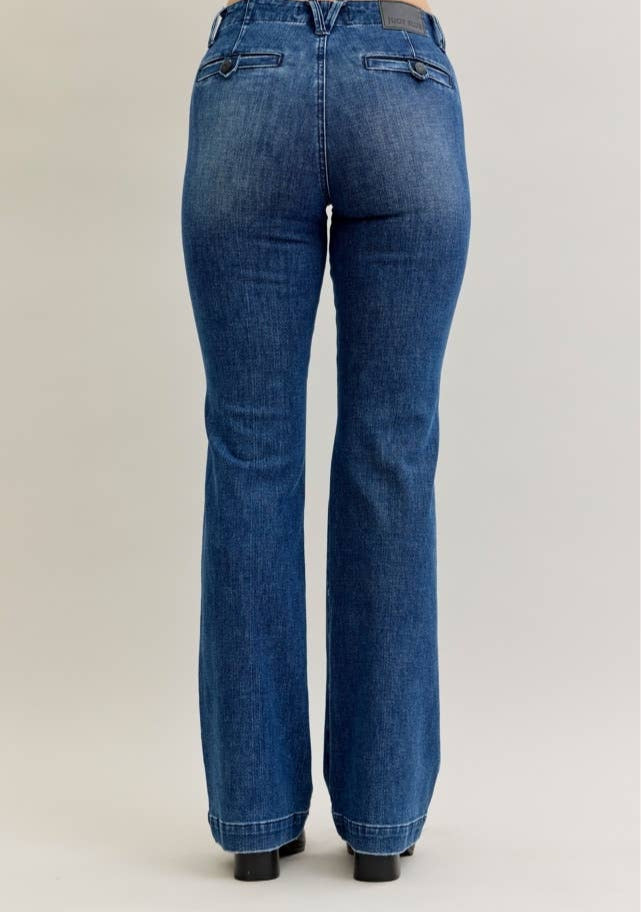Blue jeans on a plain background