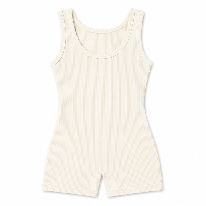 An off-white ribbed sleeveless shorts bodysuit with a scoop neckline, photographed flat against a solid white background.
