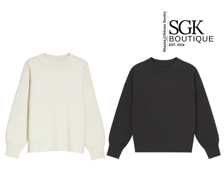 Two sweaters, one white and one black, with SGK Boutique logo on a white background.
