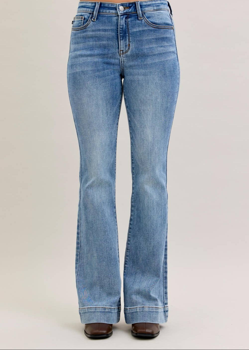 Blue jeans on a plain background