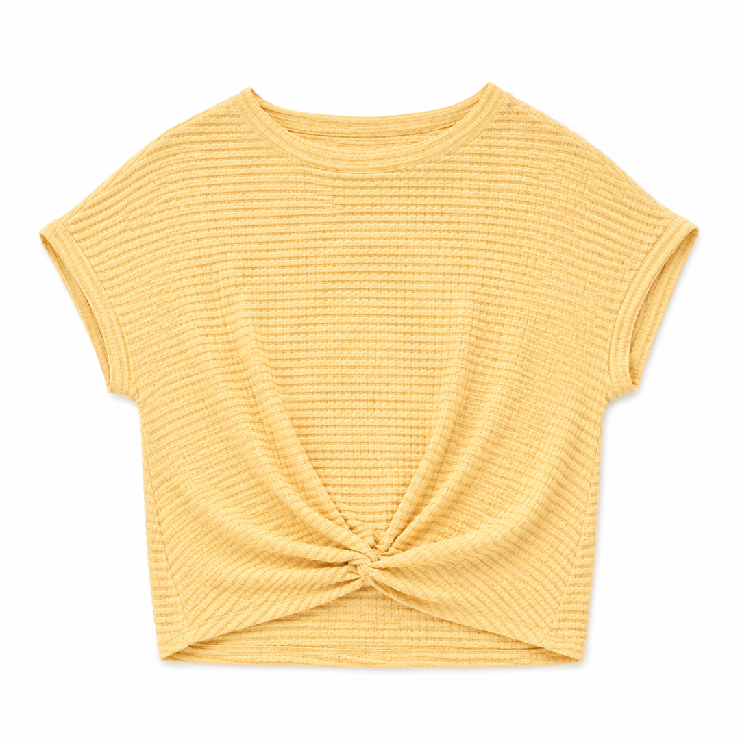 A pale yellow ribbed knit short-sleeve crop top with a twisted front detail, shown flat on a white background.