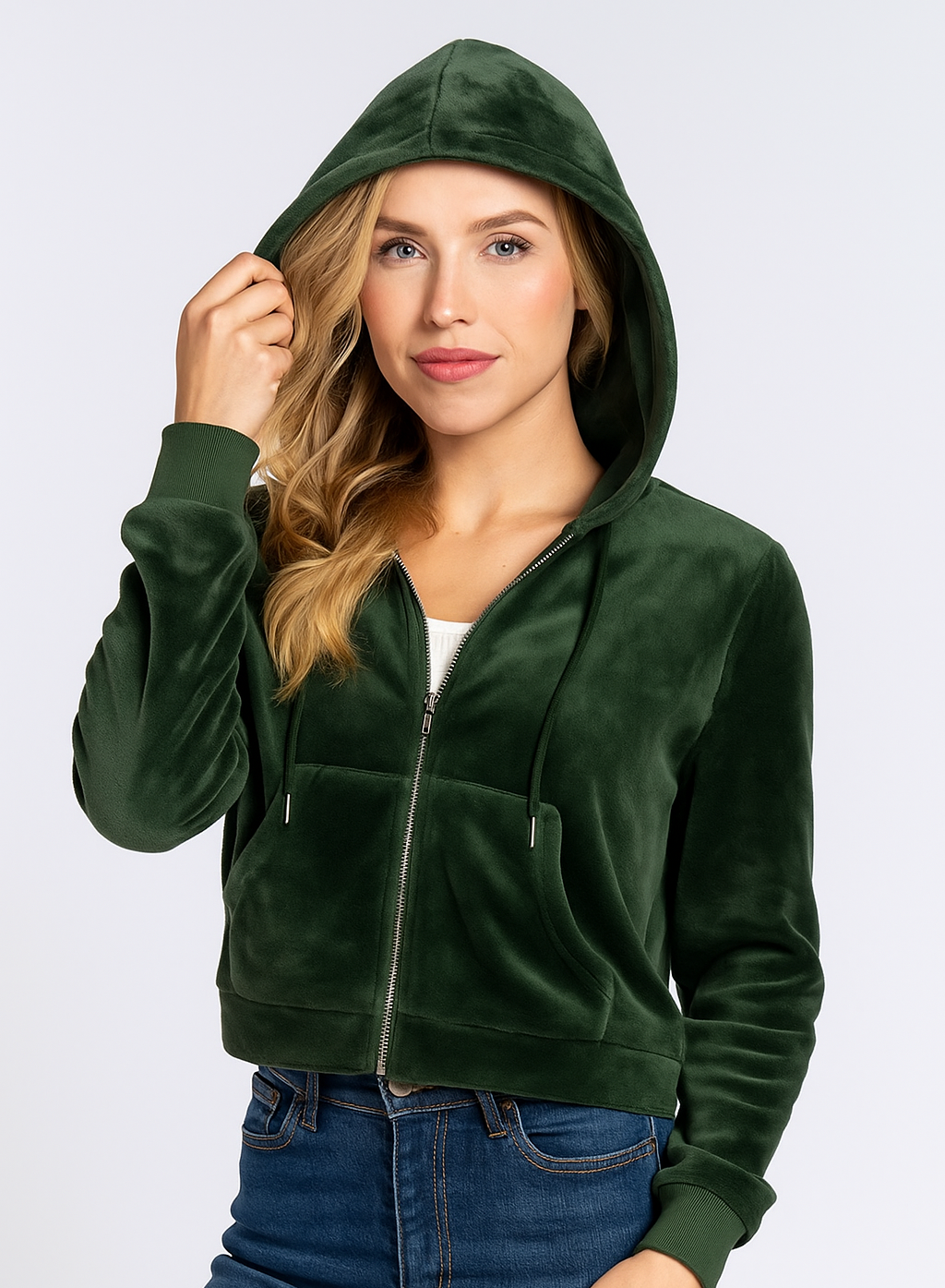 Woman wearing a green hoodie on a white background