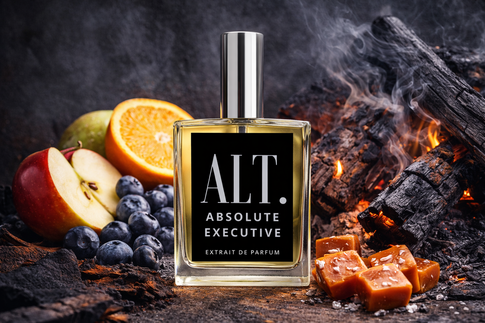 Perfume bottle labeled 'ALT. Absolute Executive' with fruits and firewood on a dark background