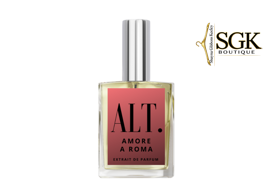 Perfume bottle with pink label and silver cap on a white background, featuring SGK Boutique logo.