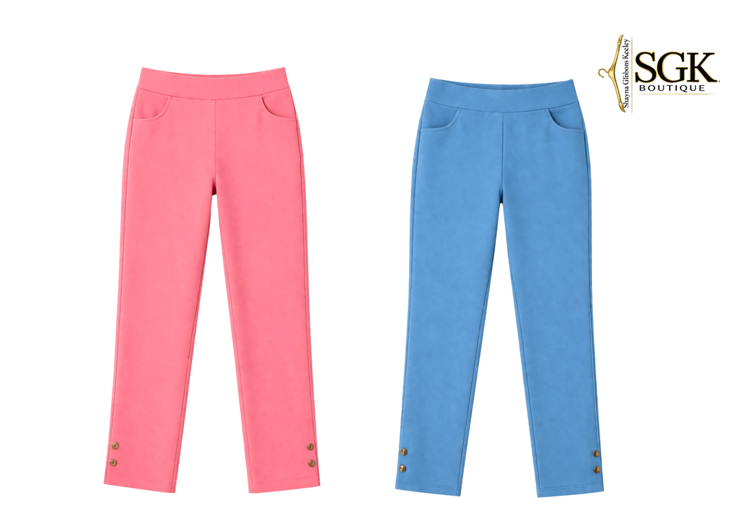 Pink and blue pants with button details on a white background, featuring SGK Boutique logo.