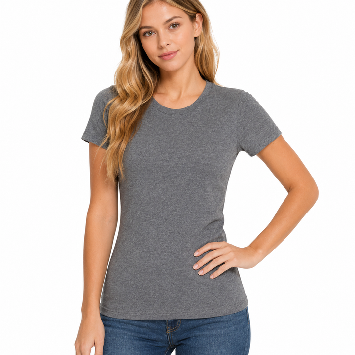 Woman wearing a gray t-shirt and blue jeans on a white background