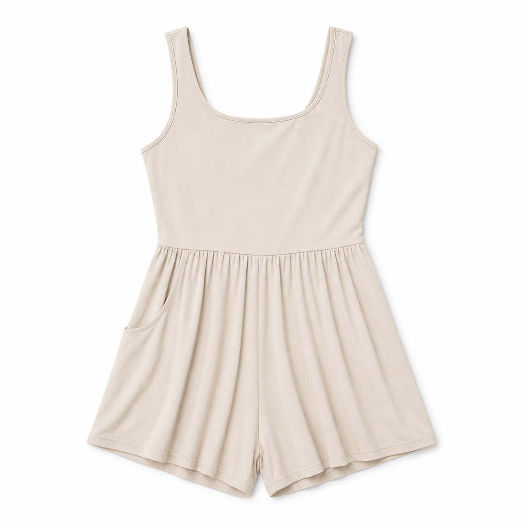 Beige romper on a white background