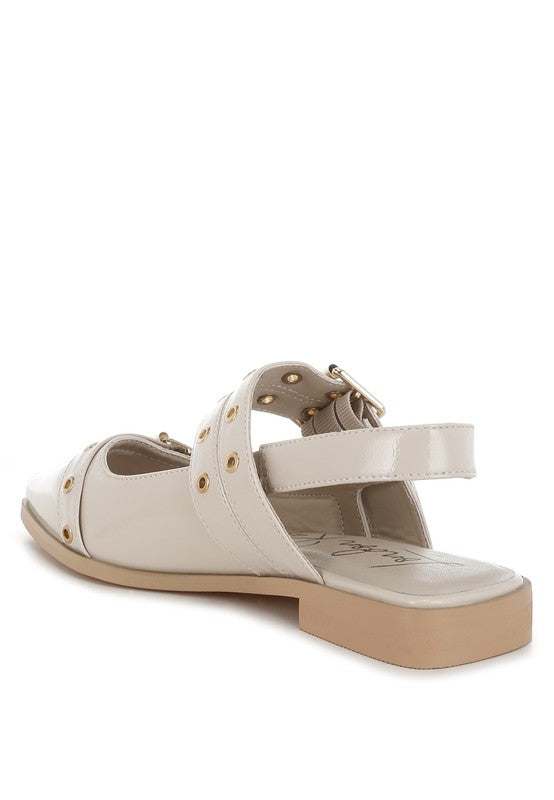 Beige sandal with a strap on a white background