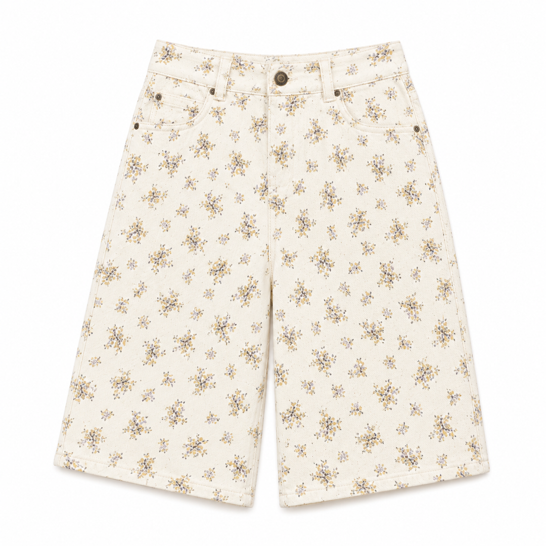Floral patterned shorts on a white background