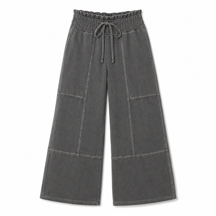 Black wide-leg pants with drawstring waist on a white background