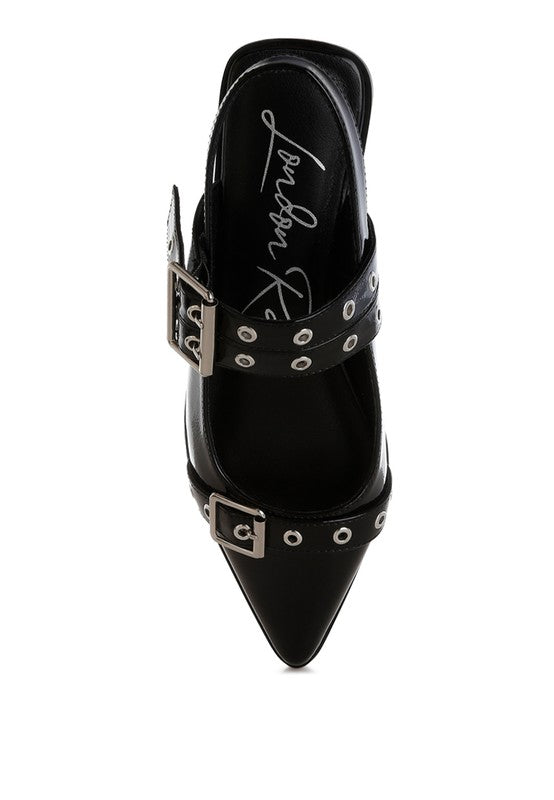 Black pointed-toe shoe with silver buckles on a white background