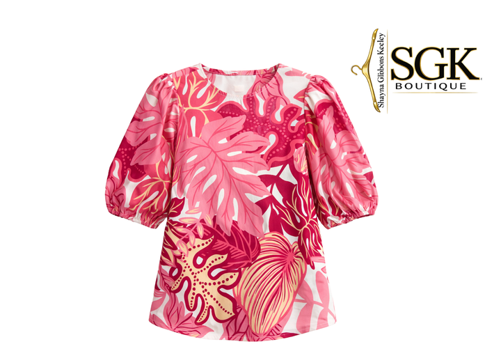 Pink floral blouse with SGK Boutique logo on a white background