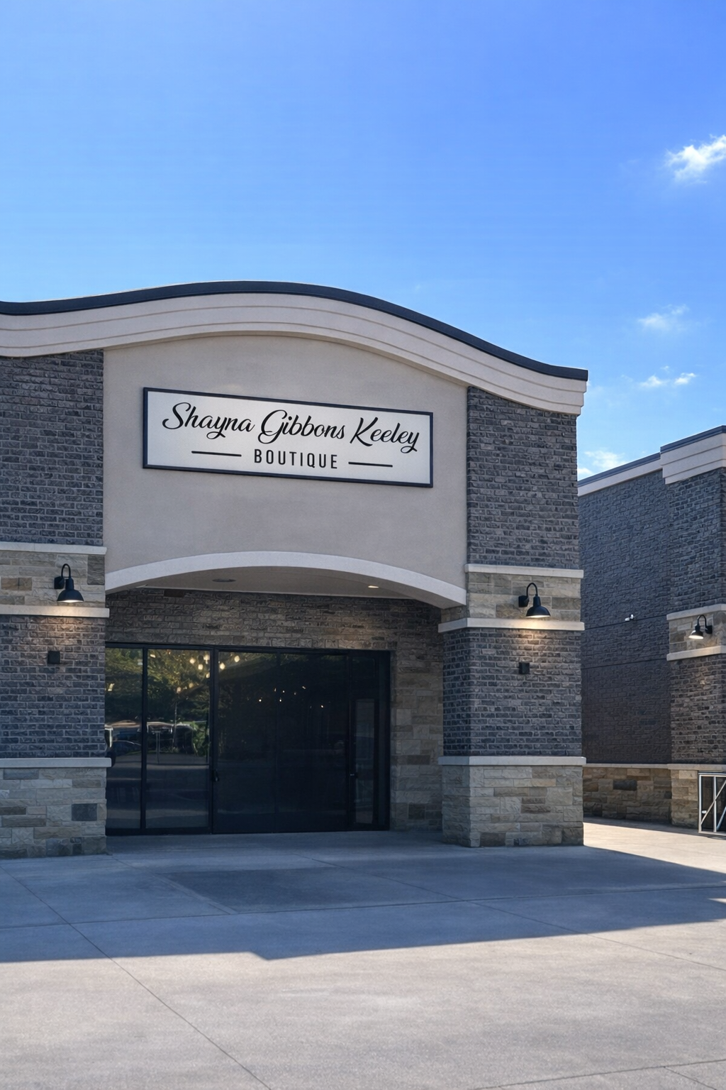 Shayna Gibbons Keeley Boutique entrance with a clear blue sky