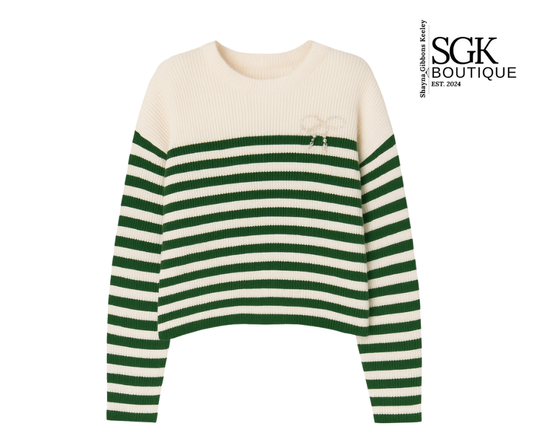 Green and white striped sweater on a white background with SGK Boutique logo.