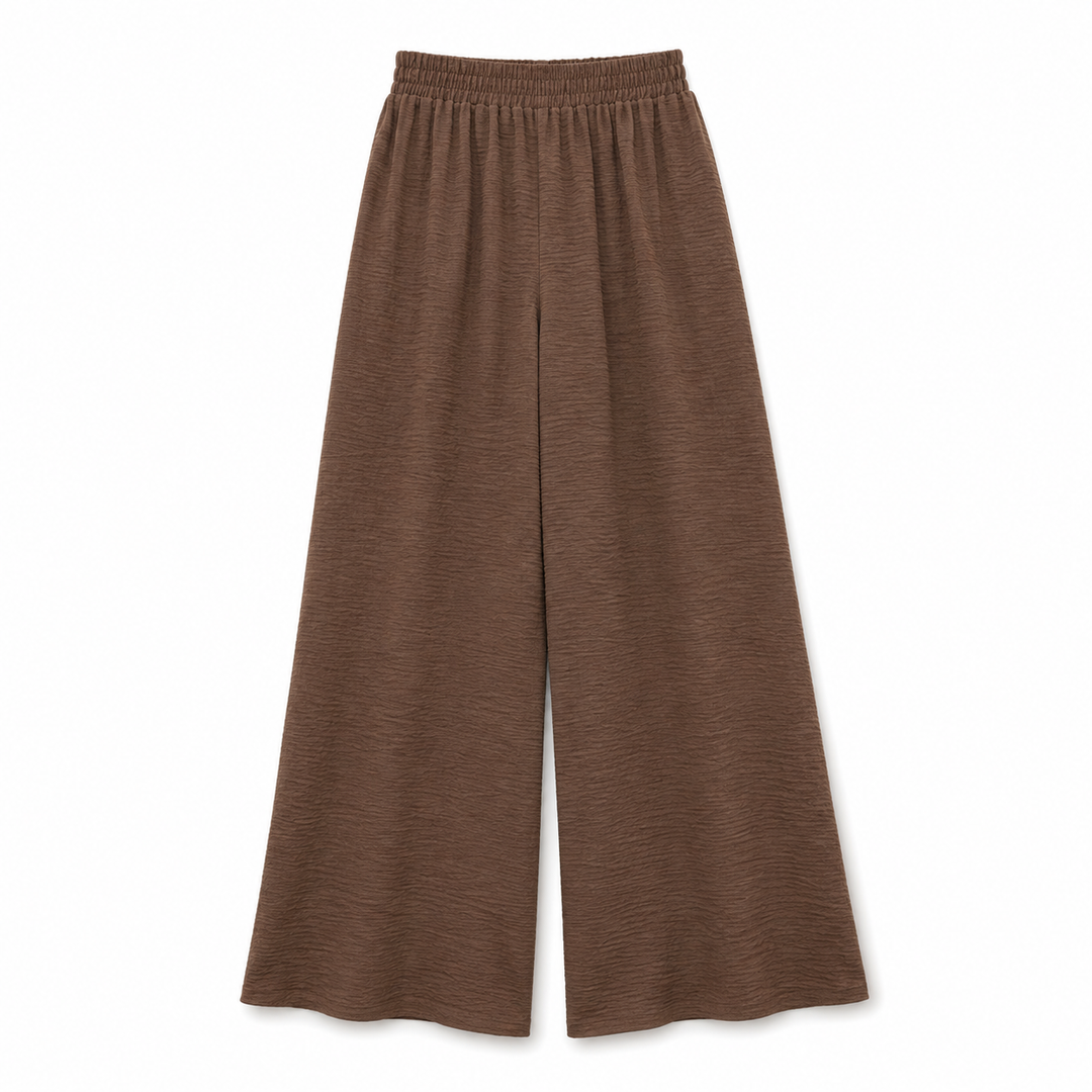 A pair of wide-leg cropped pants in a textured brown fabric, featuring an elastic waistband, shown against a plain white background.