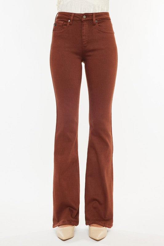 Brown flared jeans on a white background