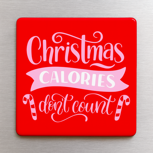 Red magnet with white and pink text on a gray background