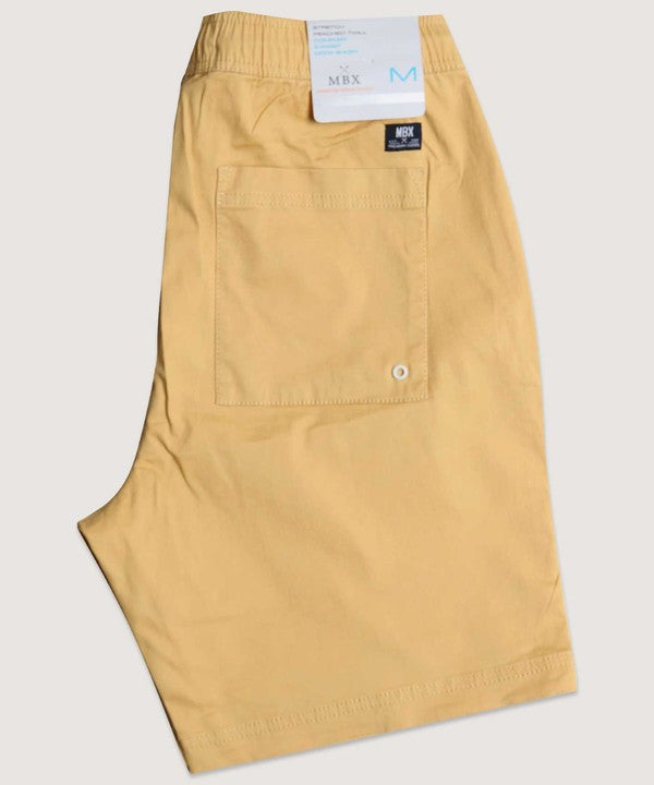 Beige pants with a visible brand label on a light gray background