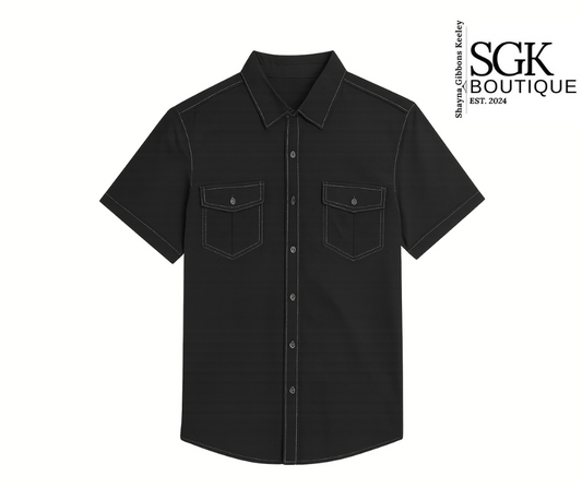Black short-sleeve shirt with two front pockets on a white background, featuring the SGK Boutique logo.