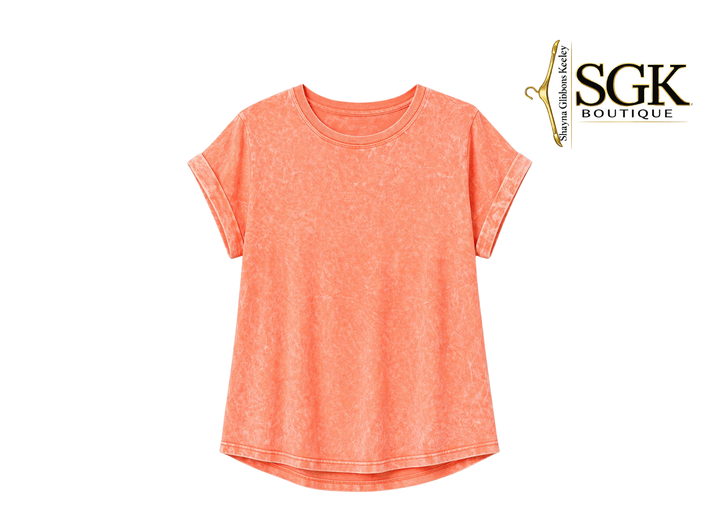 Coral t-shirt on a white background with SGK Boutique logo.