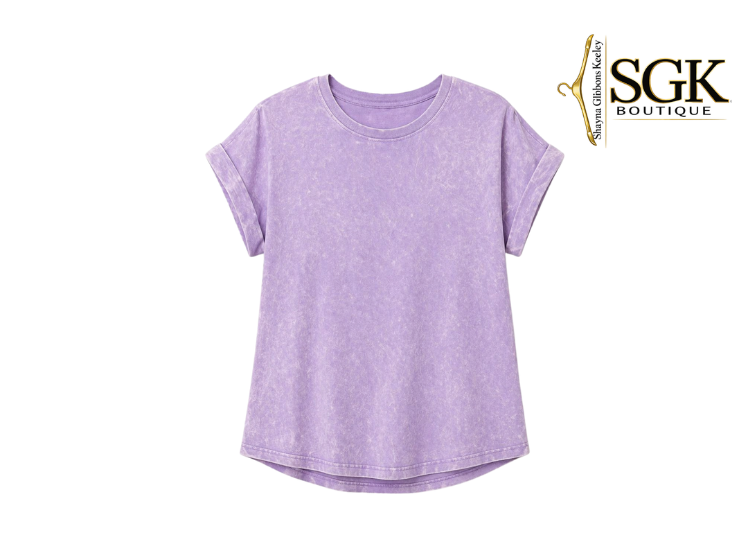 Purple t-shirt on a white background with SGK Boutique logo.