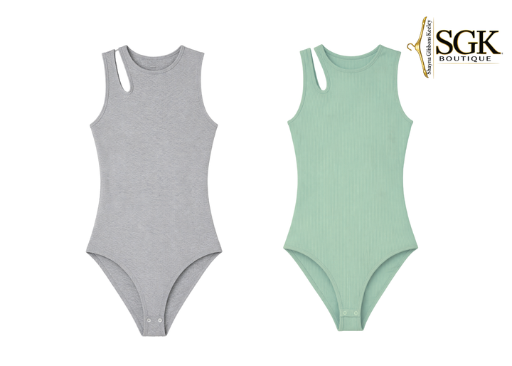 Gray and green swimsuits on a white background with SGK Boutique logo.