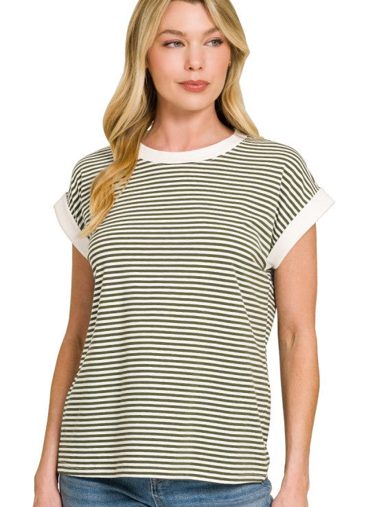 Woman wearing a striped t-shirt with a plain background