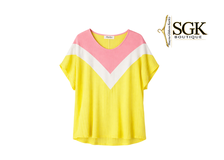 Colorful top with pink and yellow design on a white background, featuring the SGK Boutique logo.