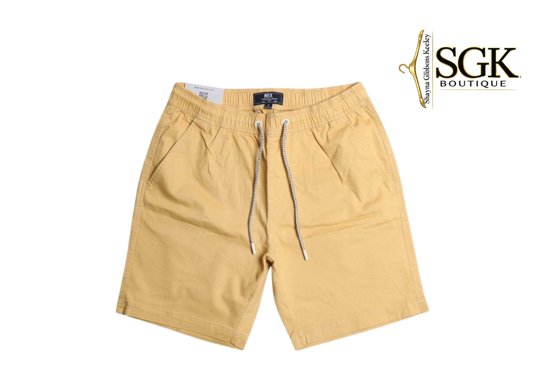 Beige shorts with a drawstring on a white background, featuring the SGK Boutique logo.