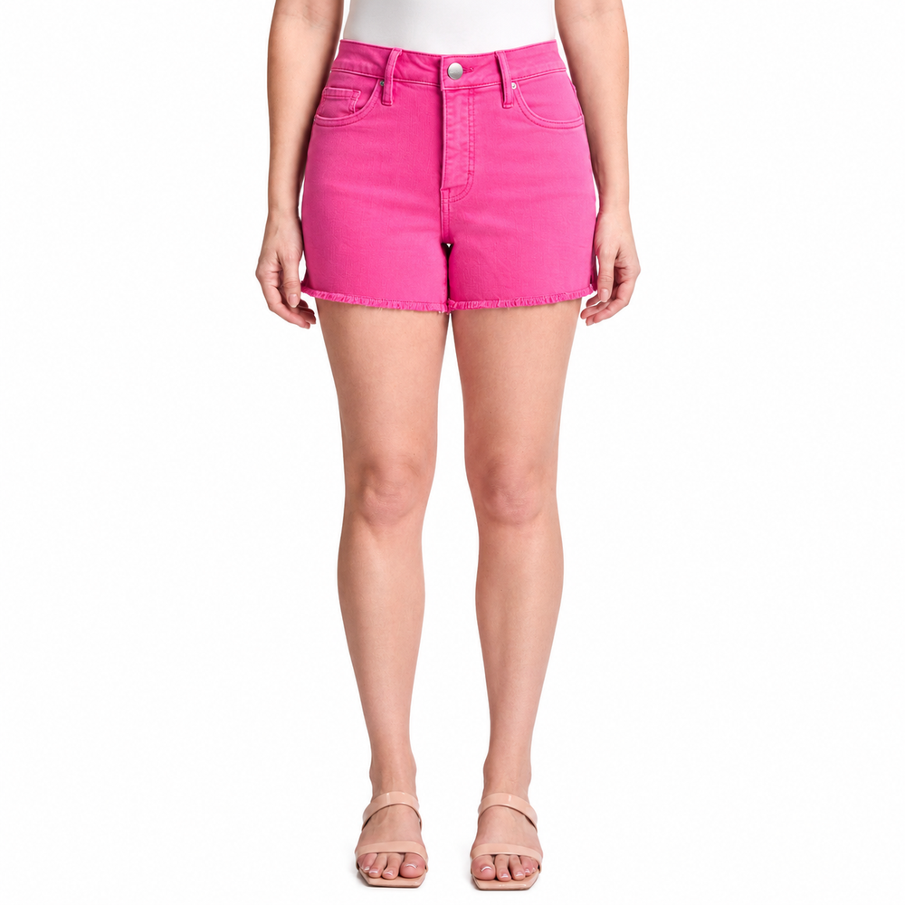 Person wearing bright pink denim shorts on a white background