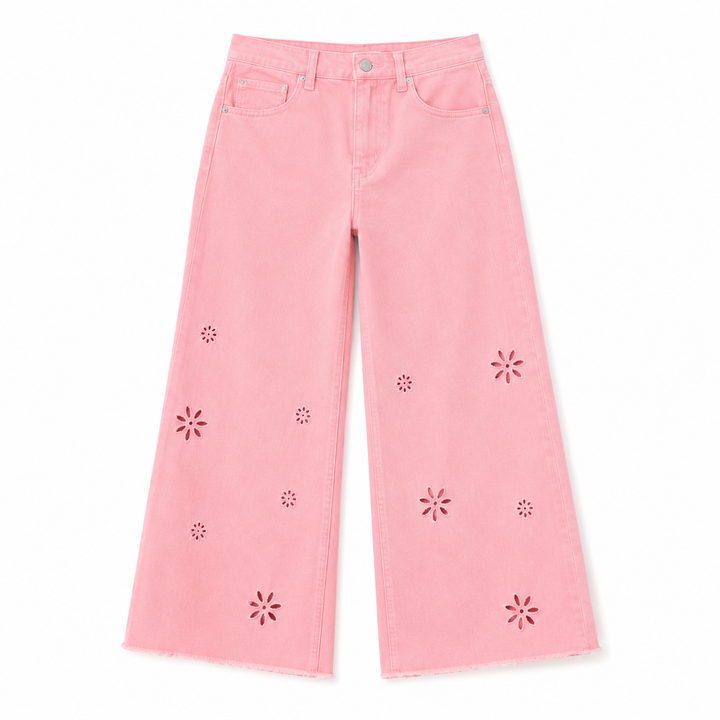 Pink jeans with floral cutouts on a white background