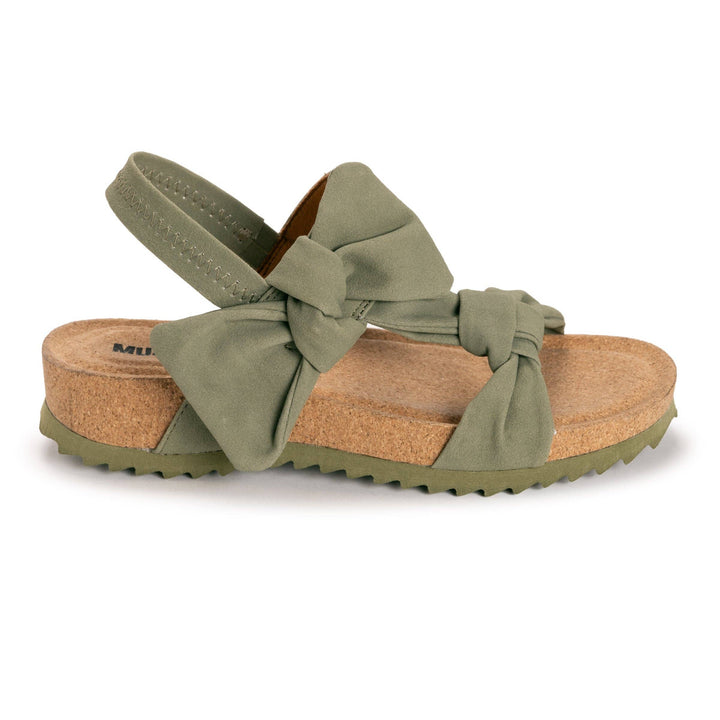 Green sandal with a bow on a white background