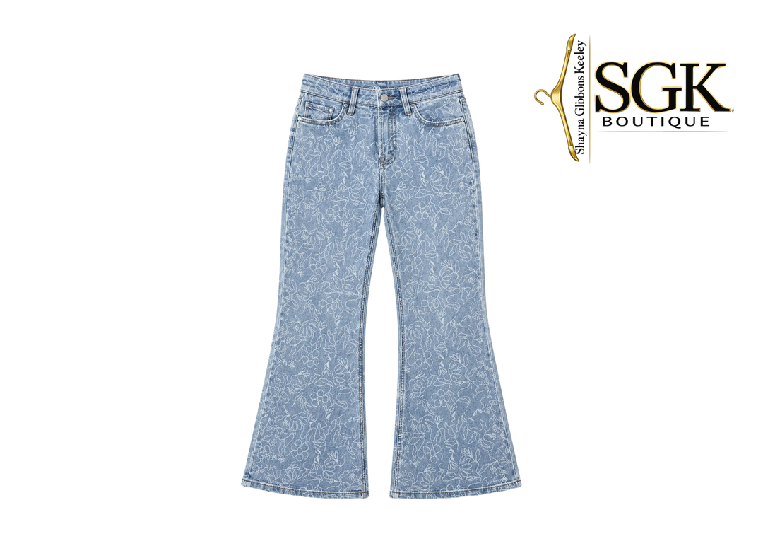 Blue jeans with a white background and SGK Boutique logo.