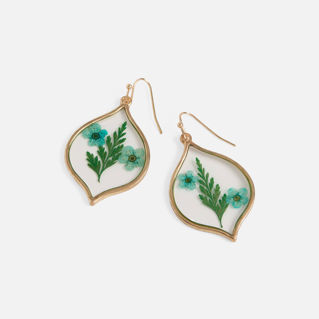 Pair of earrings with floral and leaf design on a white background