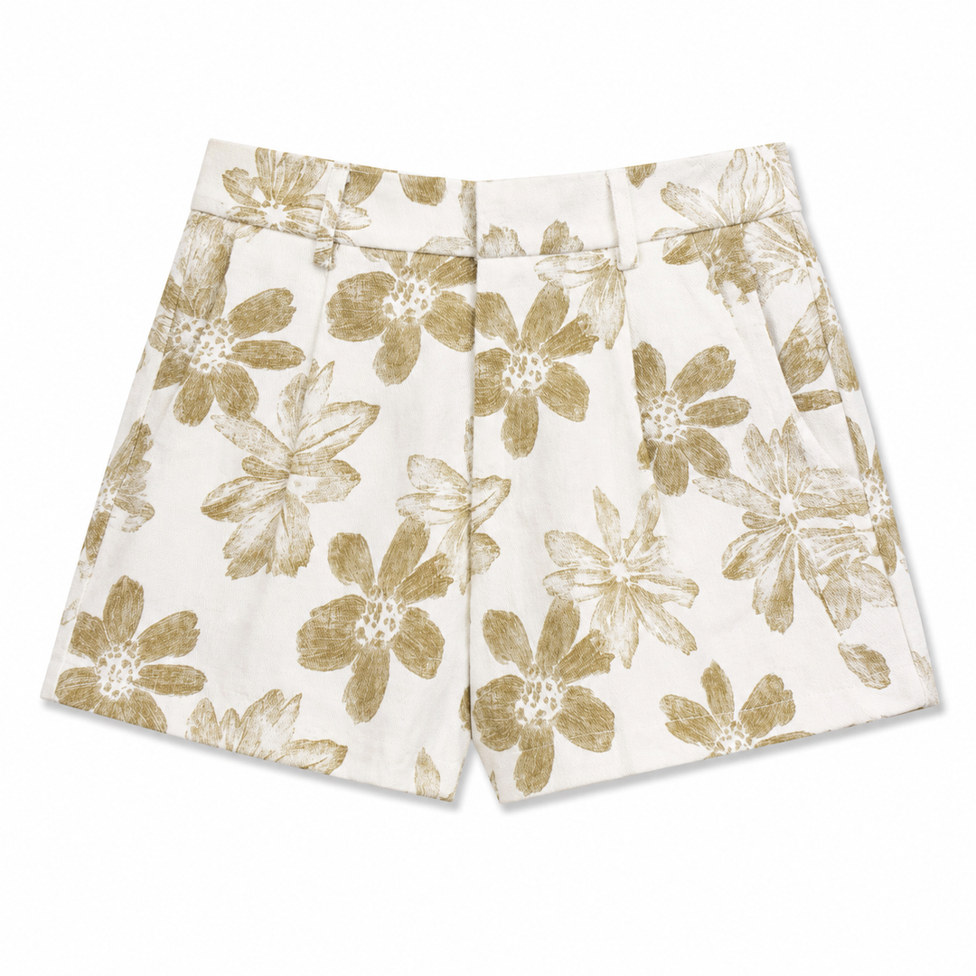 White shorts with gold floral pattern on a white background