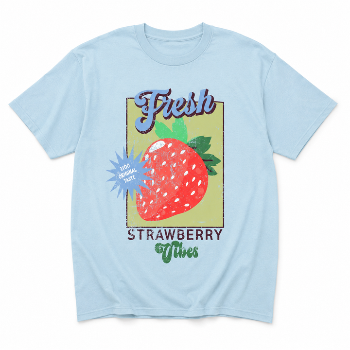 A light blue short-sleeve t-shirt with a retro-style graphic of a strawberry in a vintage-style frame, featuring the text &
