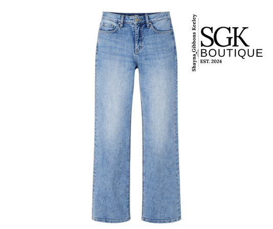 Light blue jeans on a white background with SGK Boutique logo.