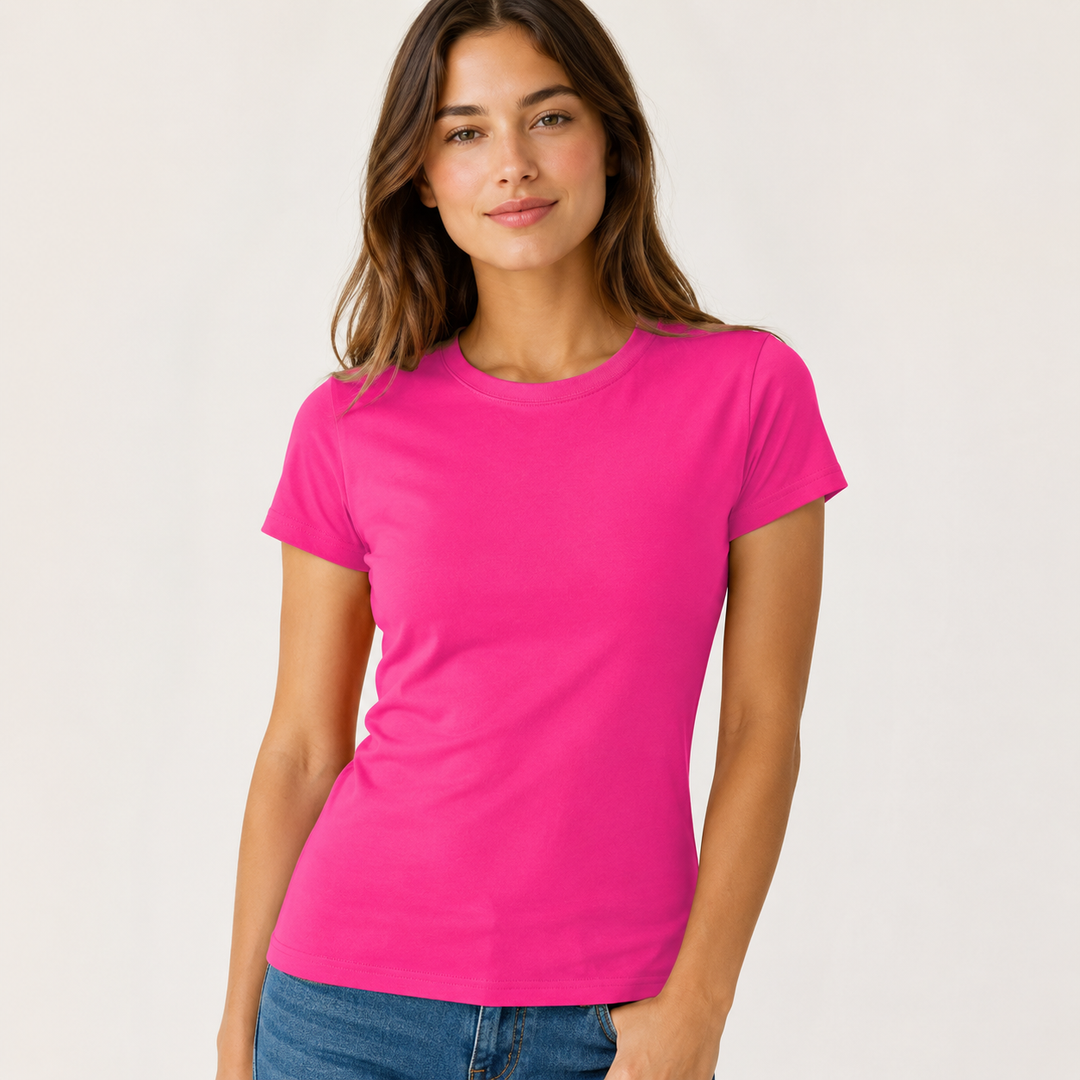 Woman wearing a bright pink t-shirt on a plain background