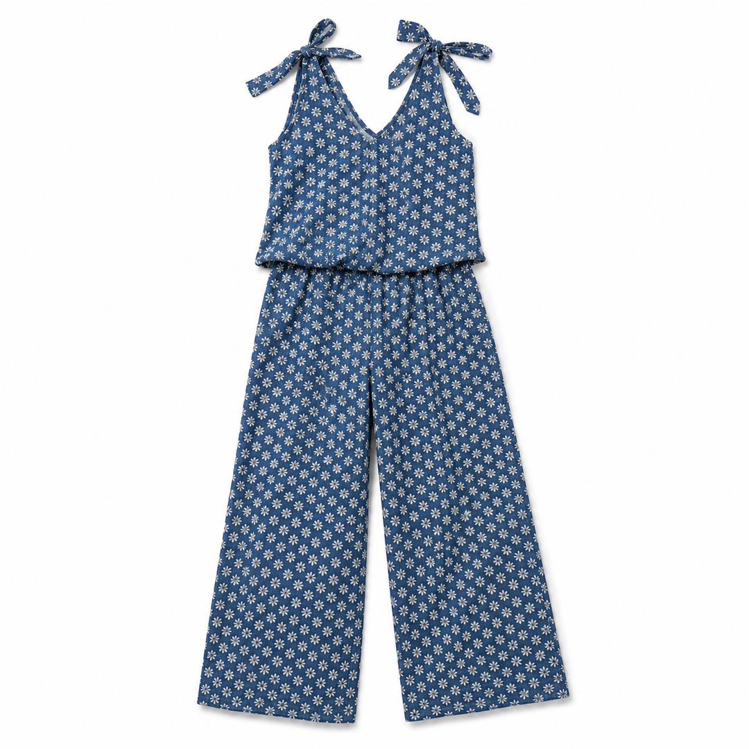 A jumpsuit featuring a sleeveless tie-shoulder straps and wide-leg pants, with small white floral pattern, shown flat on a white background.