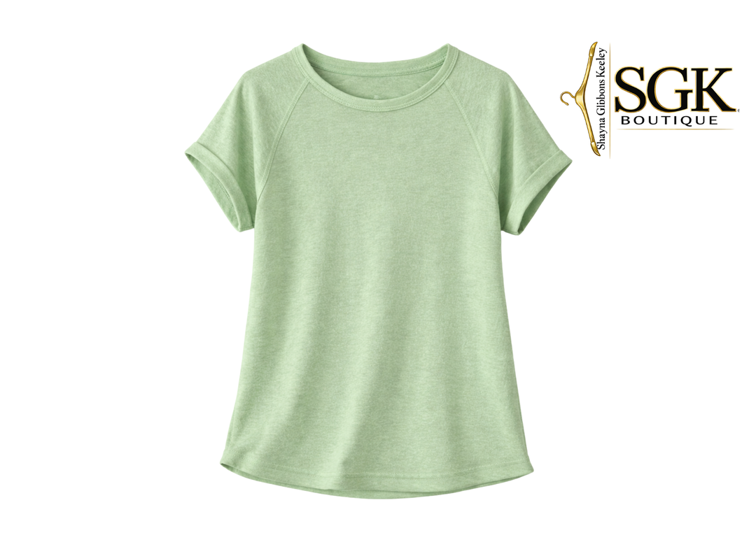 Green t-shirt on a white background with SGK Boutique logo.