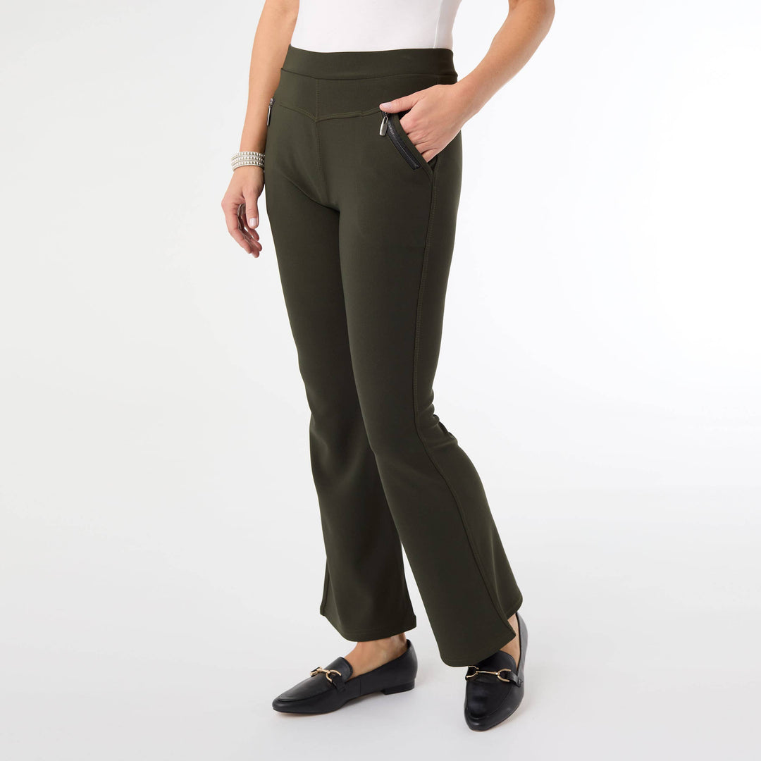 Person wearing olive green pants on a white background