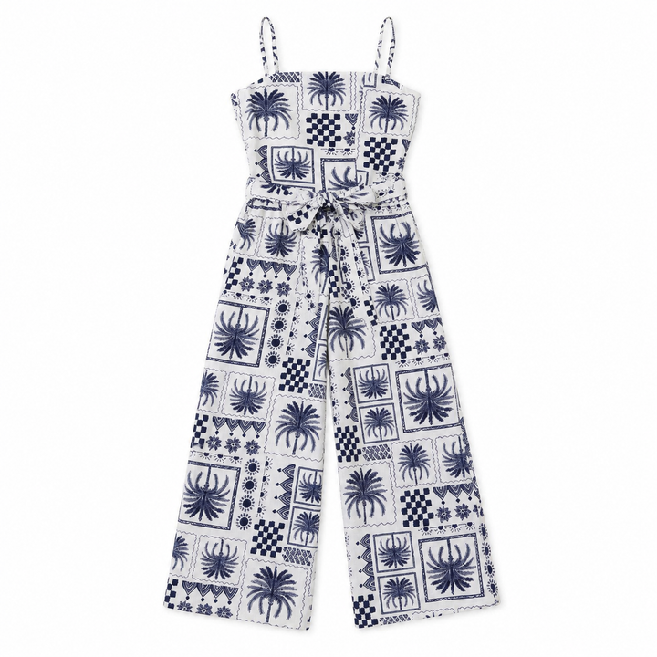 White jumpsuit with blue geometric pattern on a white background