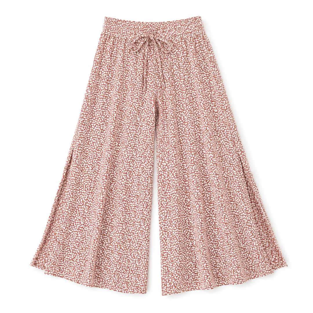 Floral-patterned wide-leg pants on a white background