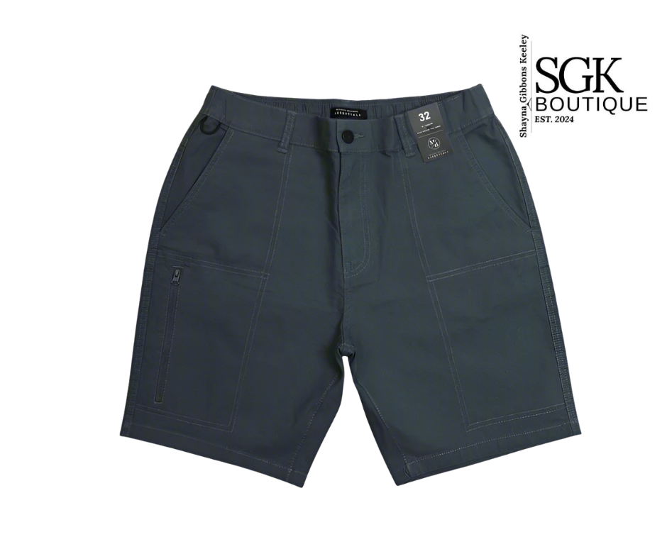 Dark gray shorts with a tag on a white background, featuring the SGK Boutique logo.