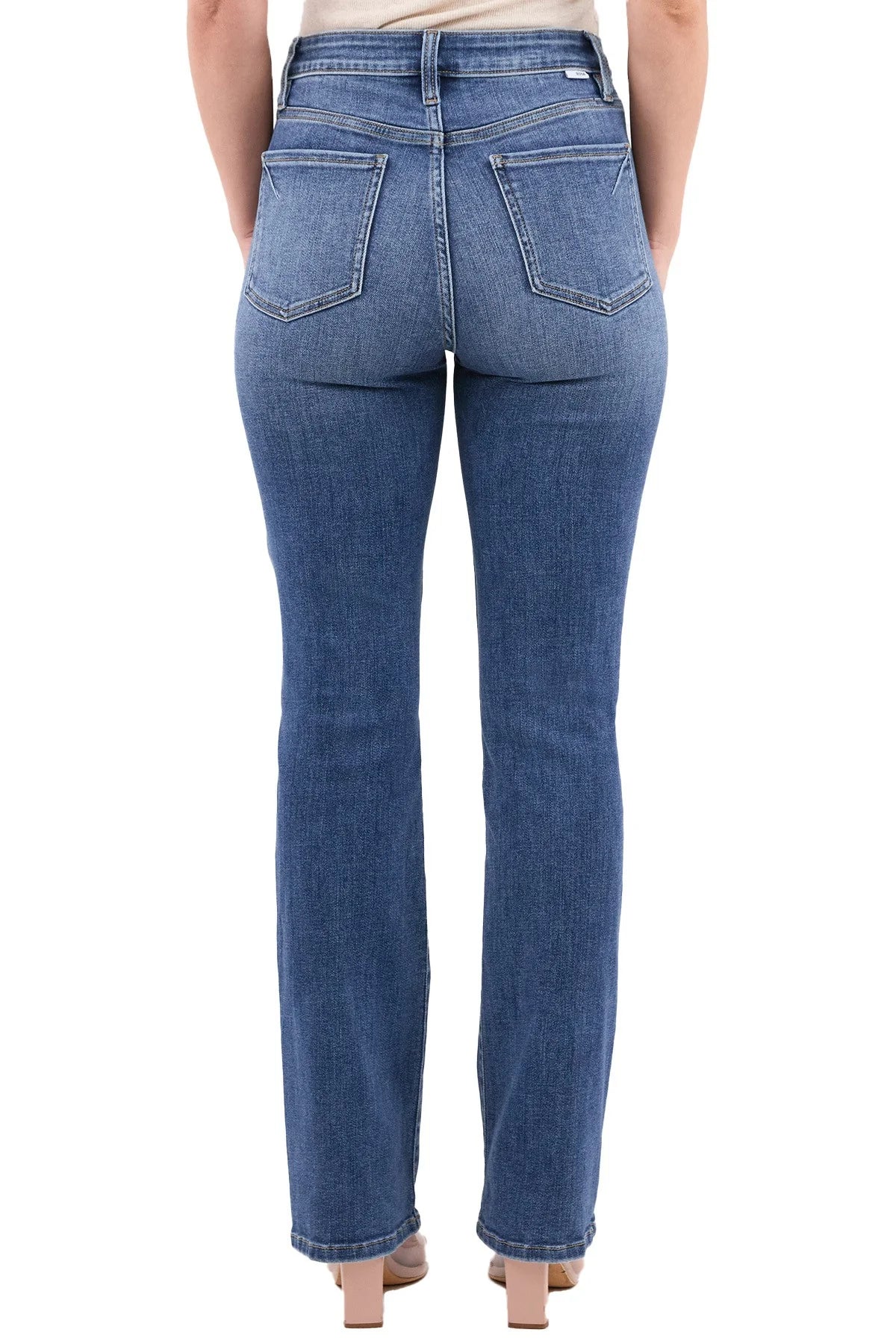 Blue jeans worn by a person on a white background