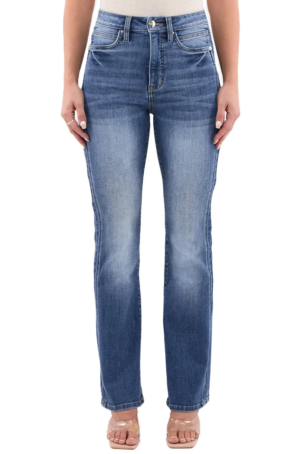 Blue jeans worn by a person on a white background