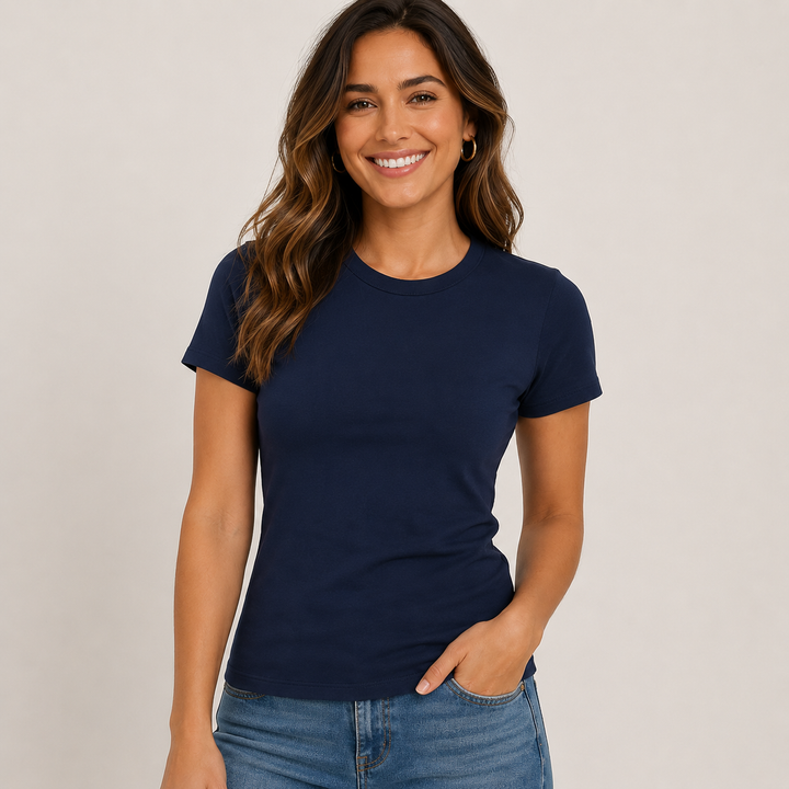 Woman wearing a navy blue t-shirt against a plain background