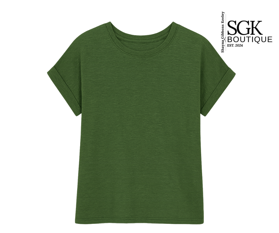 Green t-shirt on a white background with SGK Boutique logo.