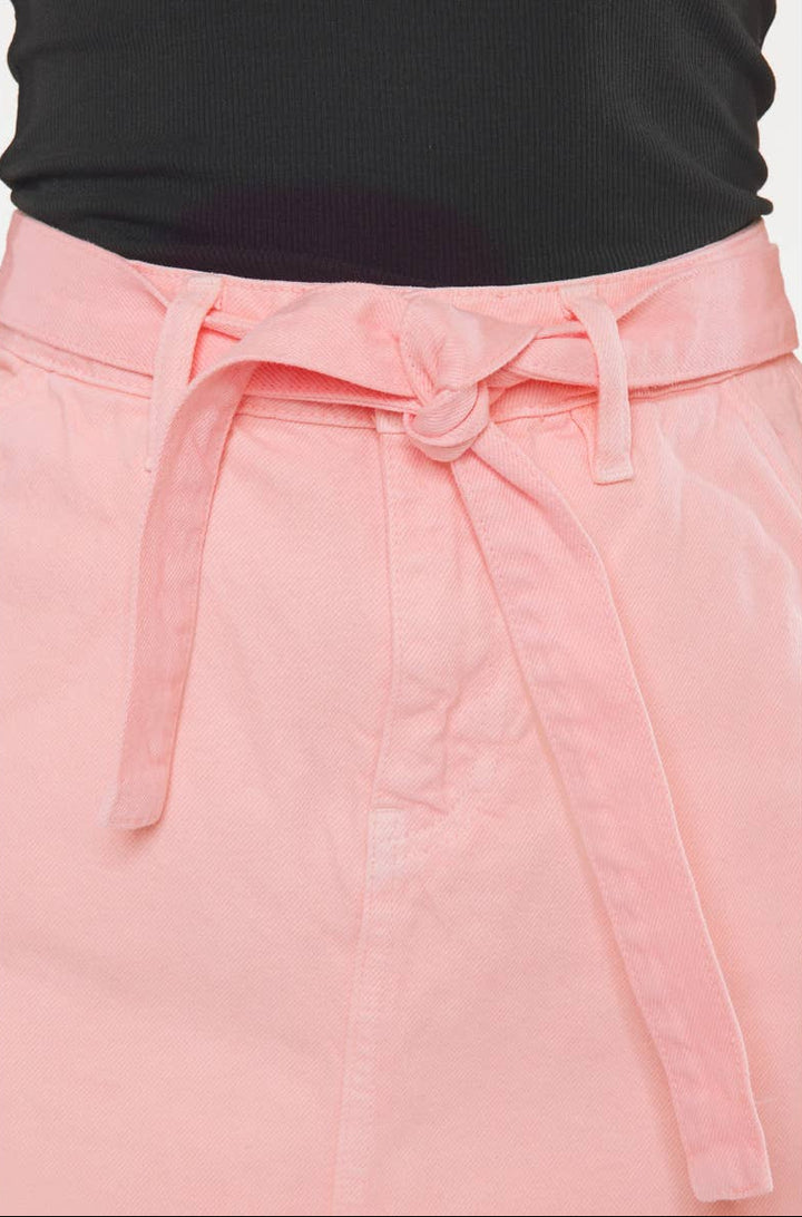 Pink skirt with a tie waist on a white background